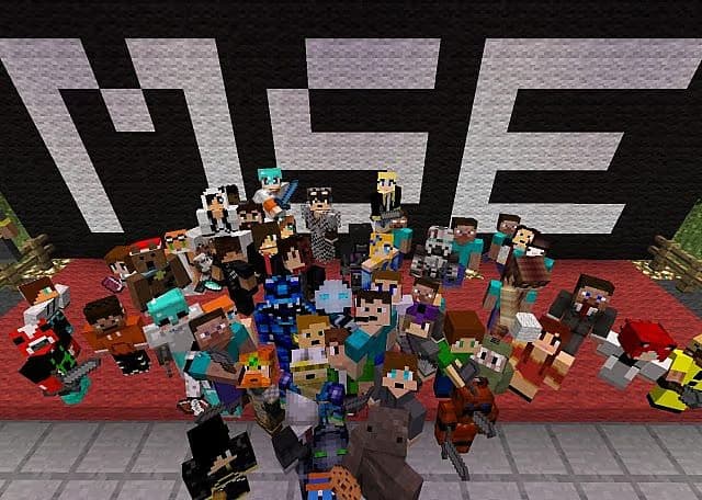 A crowd gathers around the famous 'MSE' photo area.