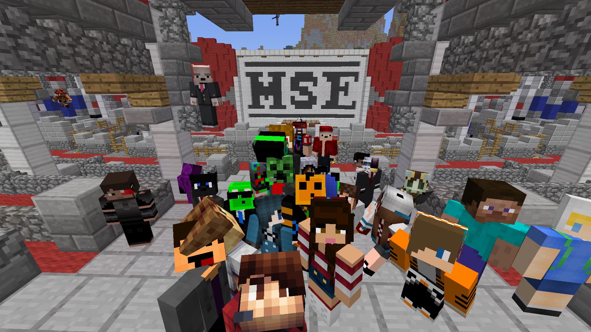 Attendees huddled around the stage entrance.