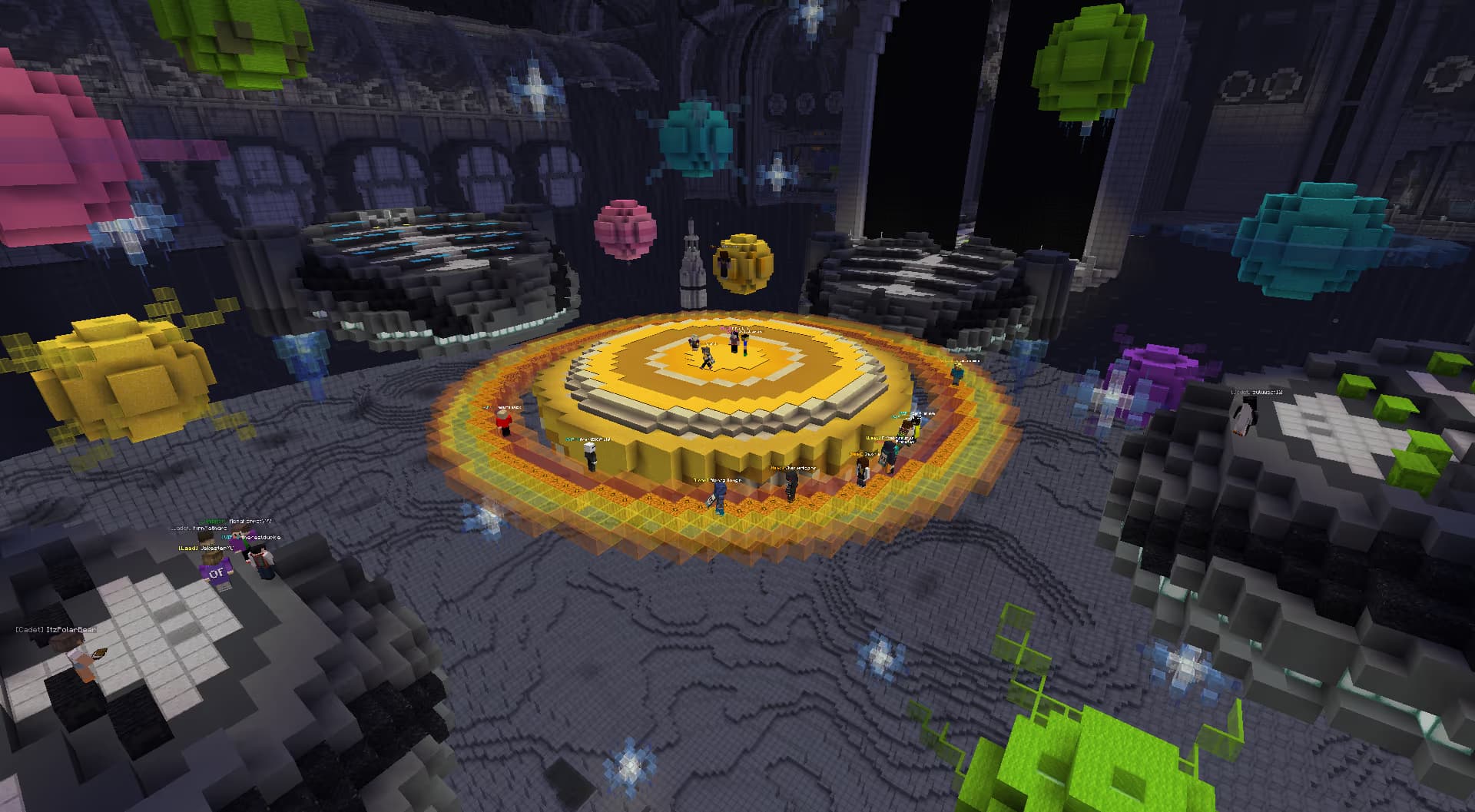  A panel takes place on the main stage, which was designed around a planet.